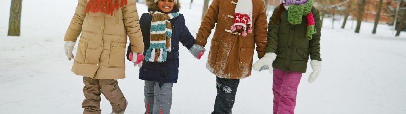 kids walking in the snow