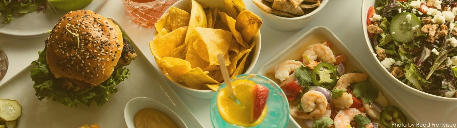 A variety of restaurant foods on a table